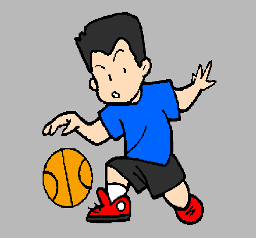Little boy dribbling ball