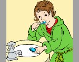 Coloring page Little boy brushing his teeth painted byAnia