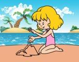 Girl making a sand castle