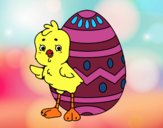 Sympathetic chick with Easter egg